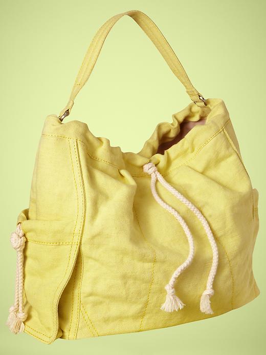 View large product image 1 of 3. Drawstring hobo bag