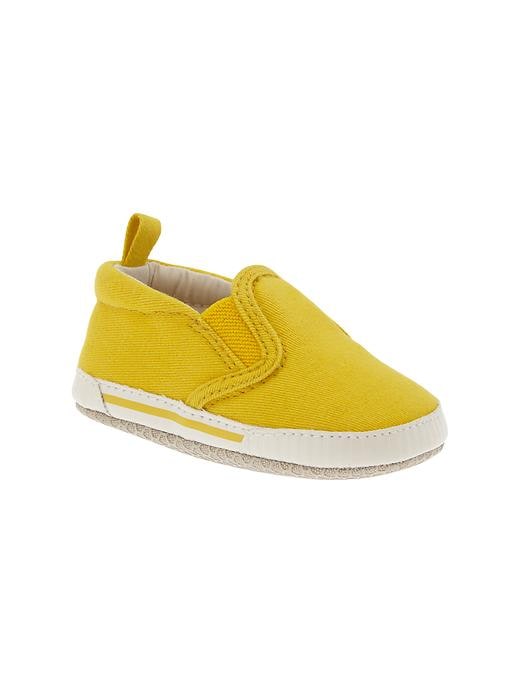 View large product image 1 of 3. Canvas slip-on sneakers