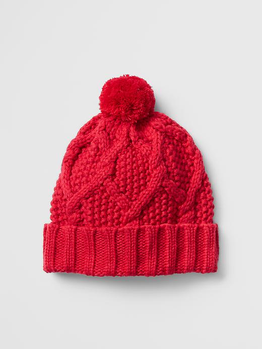 View large product image 1 of 1. Festive pom-pom honeycomb beanie