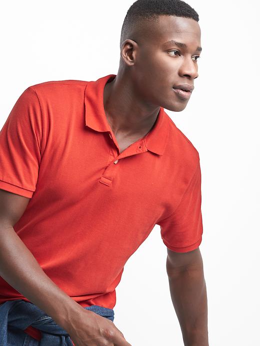 View large product image 1 of 1. Solid pique polo