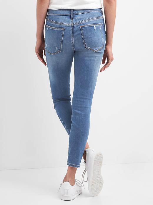 Mid Rise Destructed Skinny GapFlex Jeans