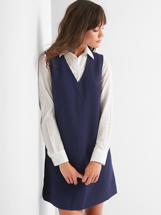 View large product image 1 of 1. Sleeveless V-neck shift dress
