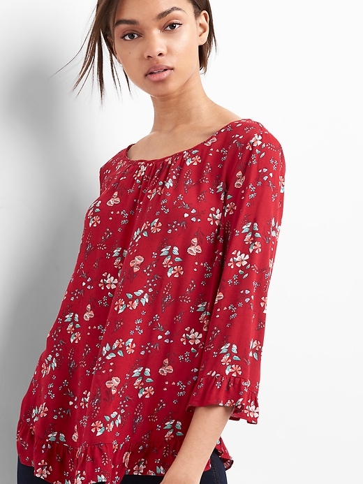 View large product image 1 of 1. Floral ruffle top