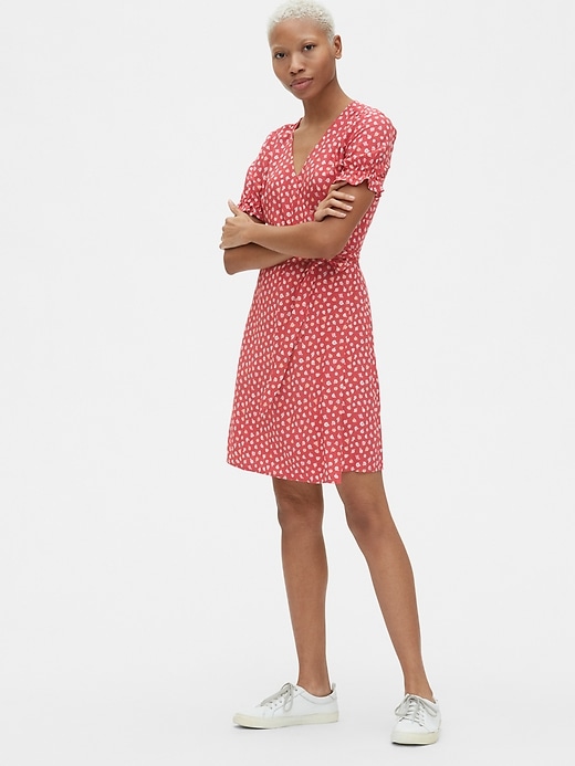 View large product image 1 of 1. Ruffle-Sleeve Mini Wrap Dress