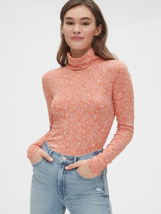 View large product image 1 of 1. Featherweight Print Turtleneck Top