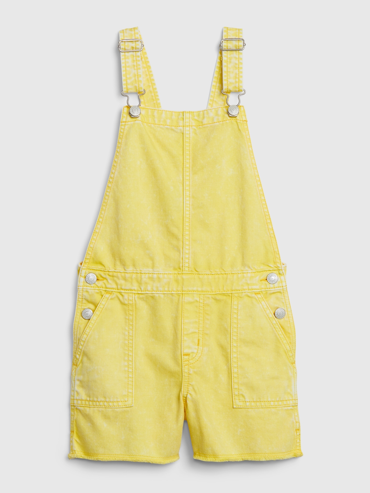 yellow baggy overalls