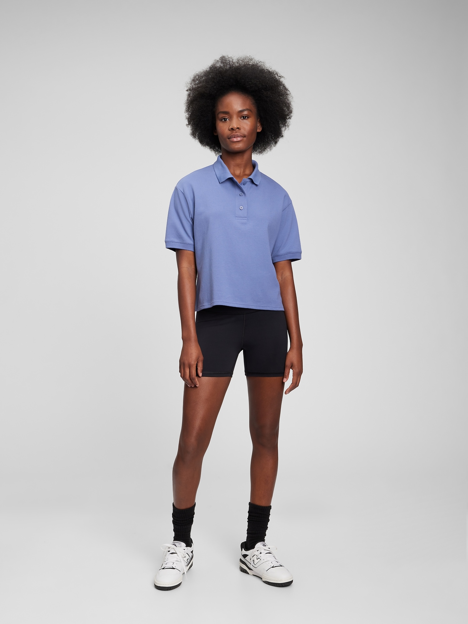 Black cropped polo shirt online