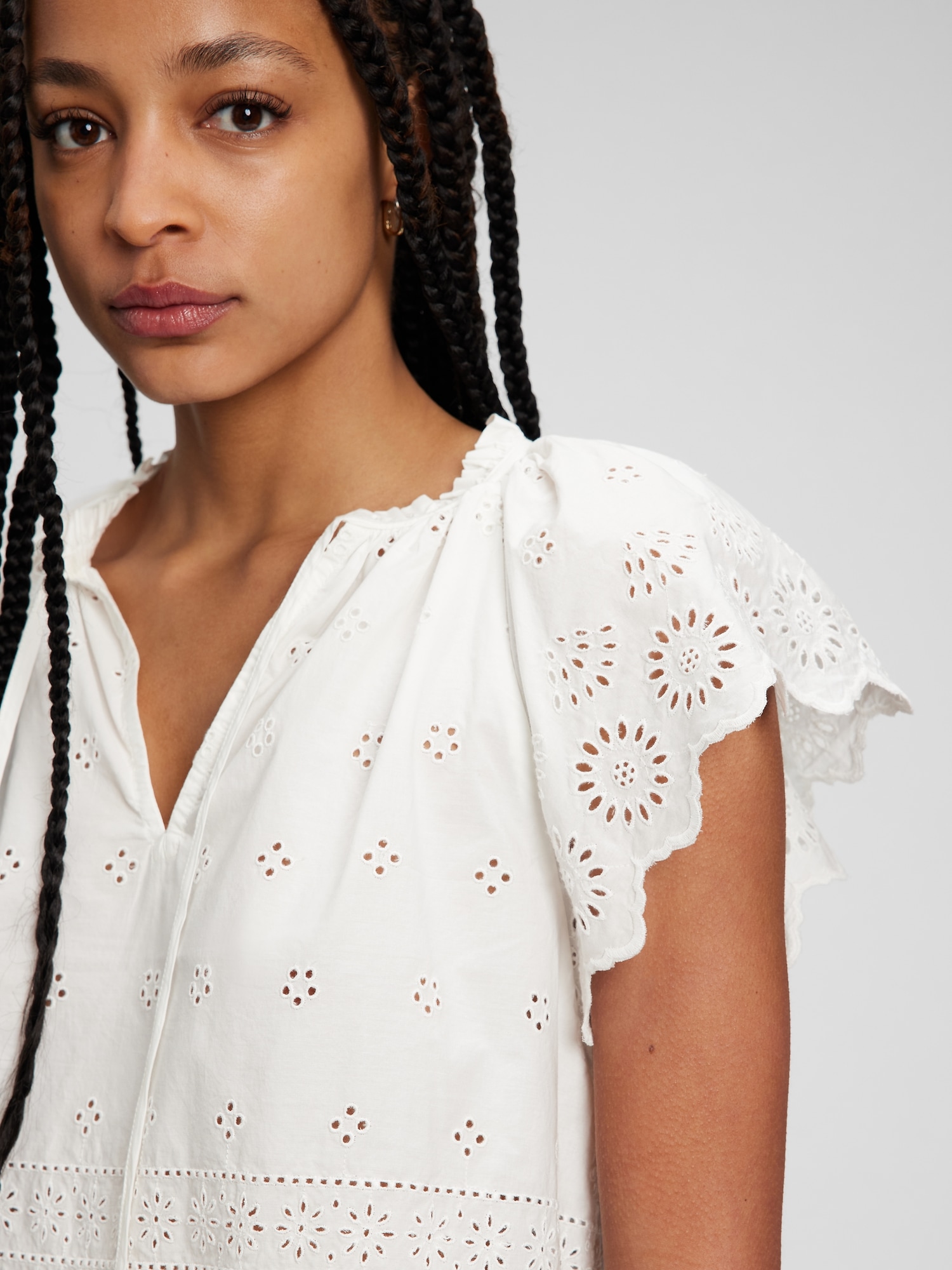 Eyelet Flutter Sleeve Top