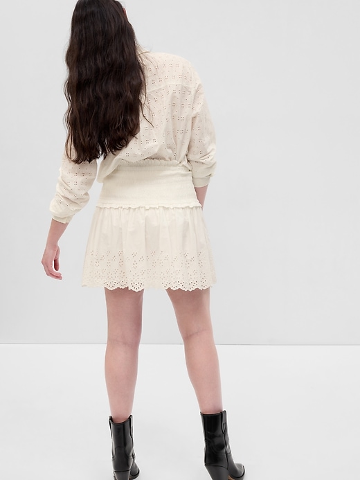 Image number 5 showing, Smocked Eyelet Mini Skirt