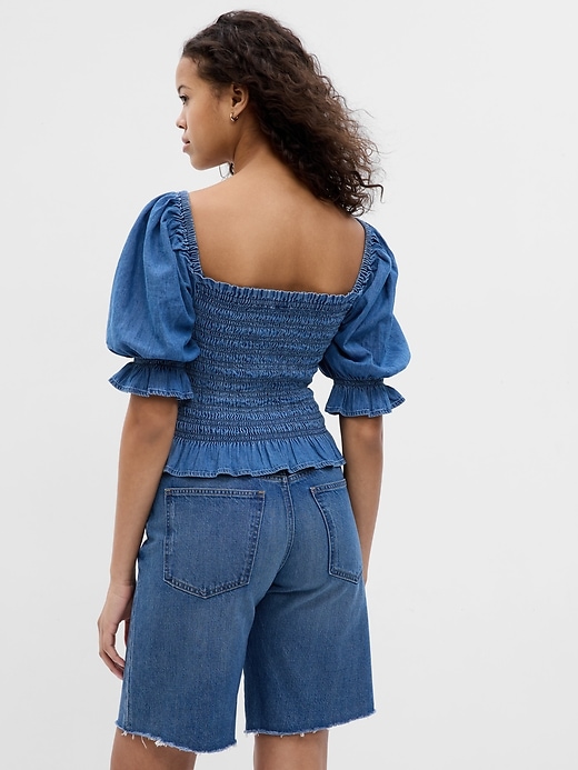 Image number 2 showing, Puff Sleeve Denim Smocked Peplum Top