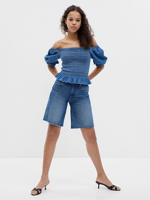 Image number 1 showing, Puff Sleeve Denim Smocked Peplum Top