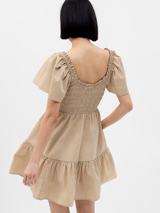 Image number 2 showing, Flutter Sleeve Smocked Mini Dress
