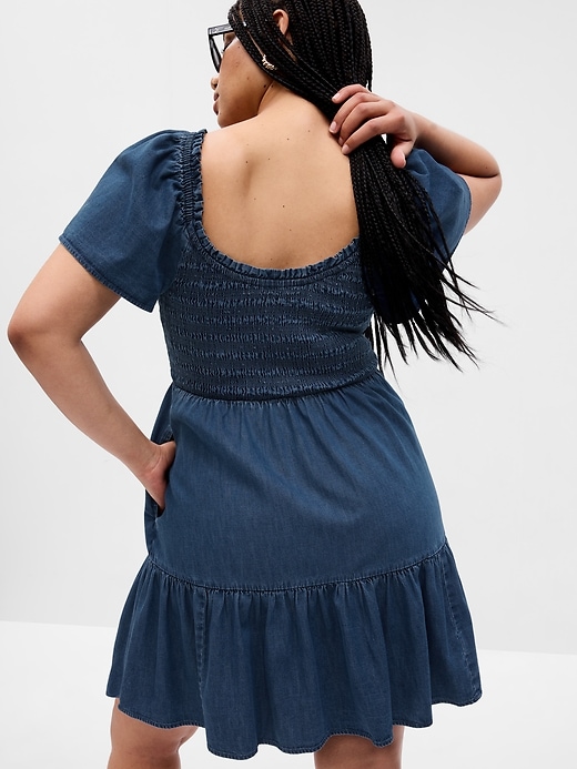 Image number 5 showing, Flutter Sleeve Smocked Denim Mini Dress