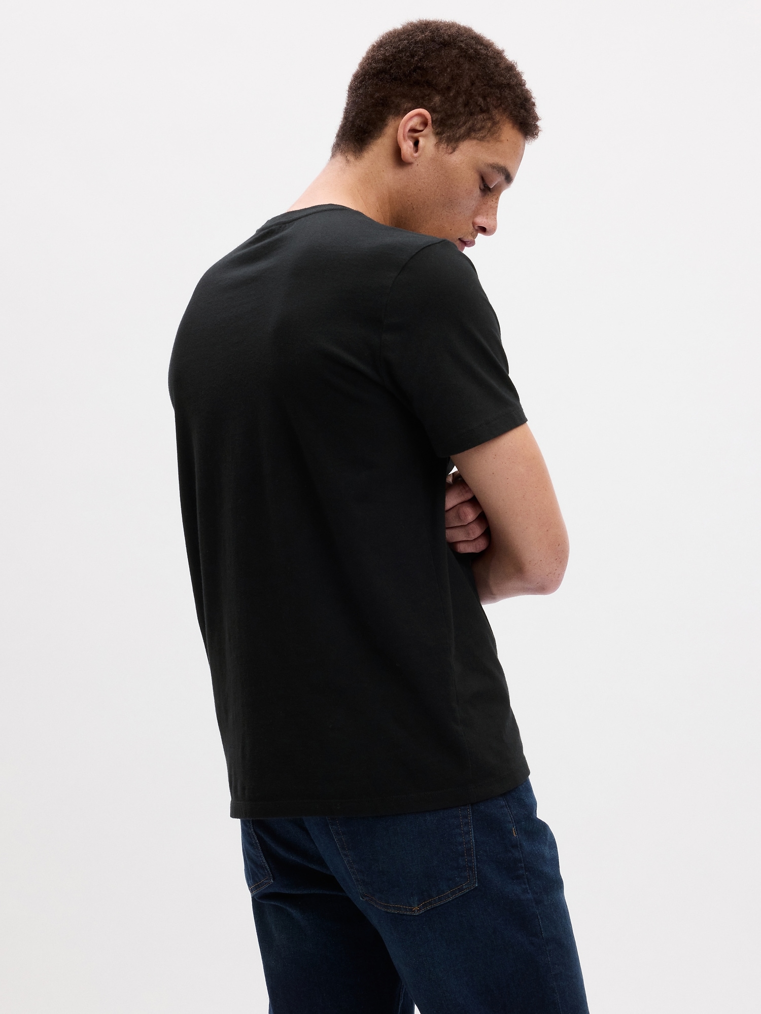 Premium Photo  Man in blank black t-shirt, front and back views
