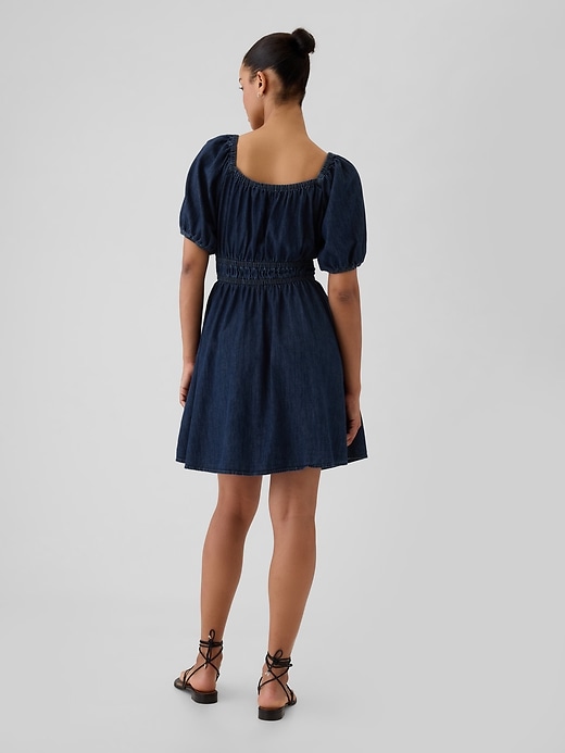 Image number 2 showing, Smocked Denim Mini Dress