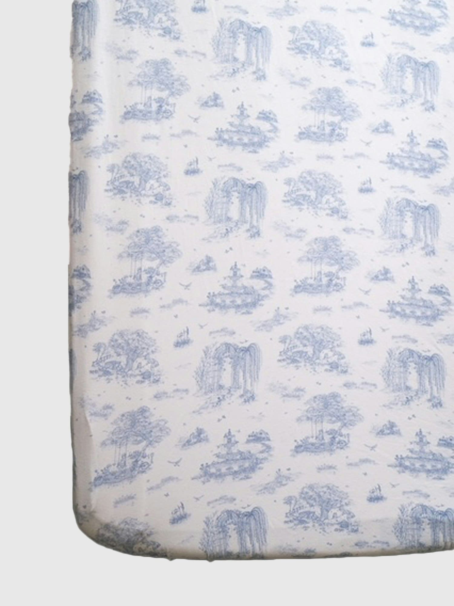 The Gilded Bird Spring Toile Blue Fitted Crib Sheet