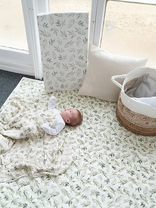 Image number 3 showing, The Gilded Bird Linen Leaves Green Quilted Playmat