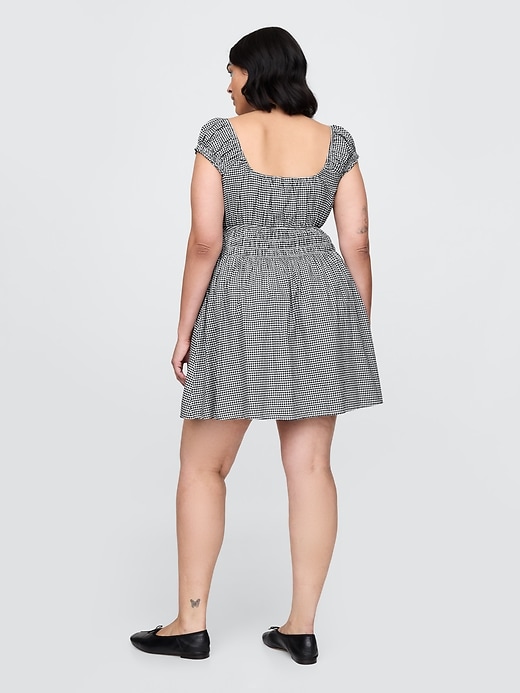 Image number 6 showing, Tie-Front Smocked Waist Mini Dress